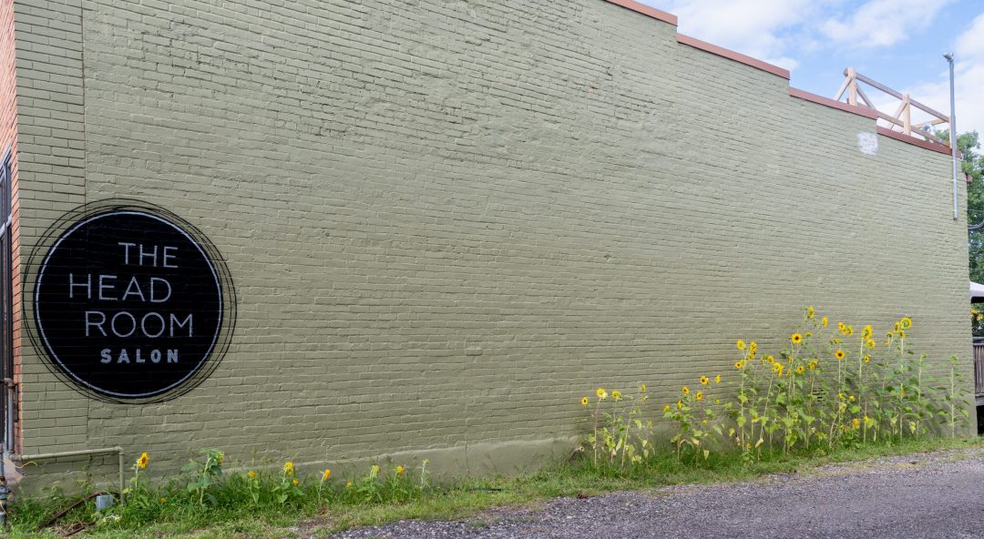 HeadRoom Salon logo on Side of building